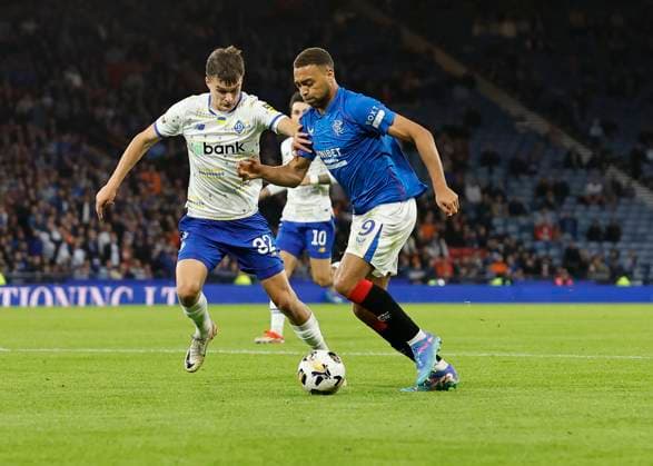 Rangers v FC Dynamo Kyiv UEFA Champions League Taras Mykhavko of FC Dynamo Kyiv (left) and Cyriel Dessers of Rangers compete for the ball during the UEFA Champions League Third Qualifying Round Second Leg match at Hampden Park, Glasgow UK Newspapers OUT Copyright: xFredxPalmerx FIL-20489-0155