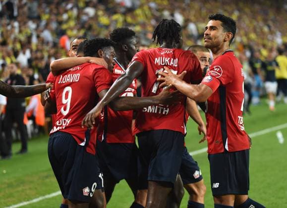 Jonathan David of Lille FC celebrates after scoring the first goal of his team with teammates during the UEFA Champions League Third Qualifying Round: Second Leg match between Fenerbahce and Lille FC at Ulker Stadium iin Istanbul , Turkey on August 13 , 2024. ( Photo by Seskimphoto ) Istanbul Turkey Istanbul Turkey Copyright: xSeskimphotox Fenerbahce-Lille-130824 (115)