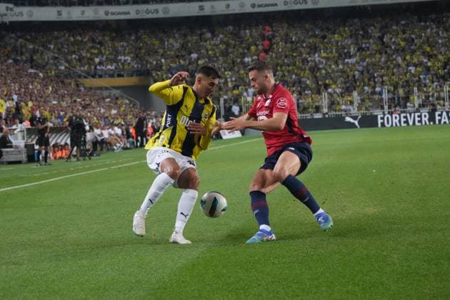 Mert Muldur of Fenerbahce and Gabriel Gudmundsson (5) of Lille FC during the UEFA Champions League Third Qualifying Round: Second Leg match between Fenerbahce and Lille FC at Ulker Stadium iin Istanbul , Turkey on August 13 , 2024. ( Photo by Seskimphoto ) Istanbul Turkey Istanbul Turkey Copyright: xSeskimphotox Fenerbahce-Lille-130824 (119)