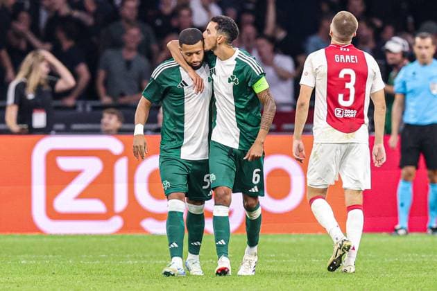 2024-08-15 AFC Ajax v Panathinaikos FC - UEFA Champions League Third Qualifying Round 2nd Leg AMSTERDAM, NETHERLANDS - AUGUST 15: Tonny Vilhena of Panathinaikos FC, Carlos Zeca of Panathinaikos FC disappointed after missing the penalty during the UEFA Champions League Third Qualifying Round 2nd Leg match between AFC Ajax and Panathinaikos FC at Johan Cruijff ArenA on August 15, 2024 in Amsterdam, Netherlands. (Photo by Peter Lous BSR Agency) Amsterdam Netherlands Content not available for redistribution in The Netherlands directly or indirectly through any third parties. Copyright: xBSRxAgencyx