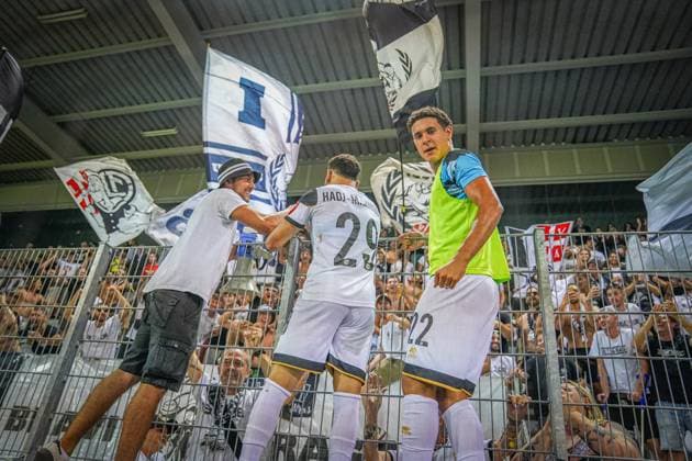 Football UEFA EURO LEAGUE 2024 2025 3rd qualifying round FC LUGANO SUI vs PARTIZAN BELGRAD SRB , Arena Thun, Switzerland Goal celebration after the 2 2 equalizer by Mohammed Abdullah Lugano 29 Joy among the fans together with teammate Ayman El Wafi Lugano 22 Thun SUI Copyright: xJOERANxSTEINSIEKx