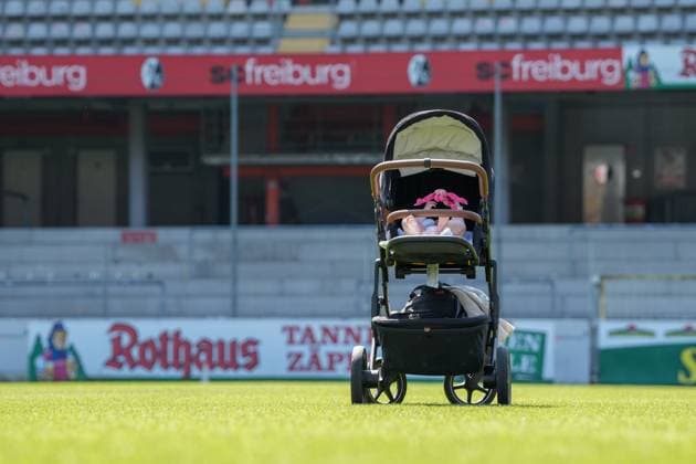 Baby carriages on the pitch, Dreisamstadion, SC Freiburg, motherhood and womens soccer, empty stands, symbolism of young talent and womens soccer, quiet atmosphere, no spectators, connection between sport and family, womens soccer, stadium, motherhood in sport, importance of women in soccer, family values, sporting context Media Day in the 2024 2025 season at SC Freiburg Frauen Copyright: xArnexAmbergx