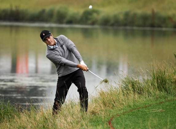August 16, 2024, Calgary, Ab, CANADA: Mario Tiziani, of the United States, hits from the rough near the water on the 18th hole during the PGA, Golf Herren Tour Champions golf event in Calgary, Alta., Friday, Aug. 16, 2024. Mario Tiziani,  - ZUMAc35_ 20240816_zaf_c35_091 Copyright: xJeffxMcintoshx