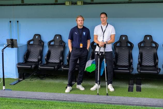 240817 Malmö FFs press officer Hjalmar Steenberg and Niklas Moisander before the Allsvenskan football match between Malmö FF and IFK Norrköping on August 17, 2024 in Malmö  Copyright: MATHILDAxAHLBERG BB240817MA138