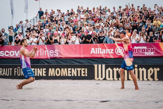 Beach volleyball men Allianz German Beach Tour 2024 Tourstop Kühlungsborn 2 18 08 2024 f l Eric Stadie and Momme Lorenz celebrate after their victory and advance to the final Kühlungsborn Beach at the pier Mecklenburg-Vorpommern Germany
