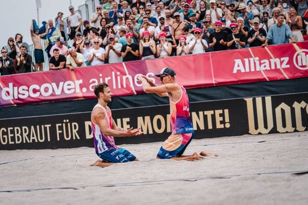 Beach volleyball men Allianz German Beach Tour 2024 Tourstop Kühlungsborn 2 18 08 2024 f l Eric Stadie and Momme Lorenz celebrate after their victory and advance to the final Kühlungsborn Beach at the pier Mecklenburg-Vorpommern Germany