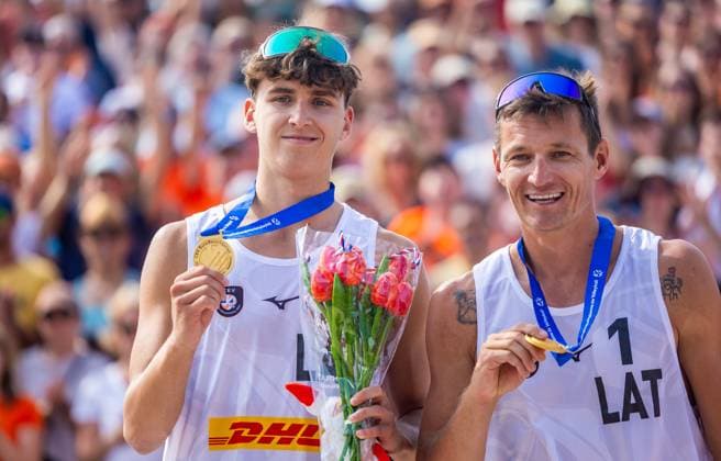 THE HAGUE - Martins Plavins and Kristians Fokerots from Latvia with the gold medal at the 2024 European Beach volleyball, Beachvolleyball Championships. ANP IRIS VAN DEN BROEK xVIxANPxSportx xxANPxIVx 506253908 originalFilename: 506253908.jpg