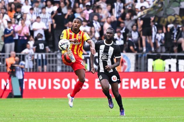 Wesley Said ( 22 - Lens ) and Jean Eudes Aholou ( 6 - Angers ) during the Ligue 1 match between Angers SCO and RC Lens at Stade Raymond Kopa on August 18, 2024 in Angers, France. ( Photo by federico pestellini panoramic ) - FOOTBALL : Angers vs Lens - Ligue 1 - 18 08 2024 FedericoPestellini Panoramic 