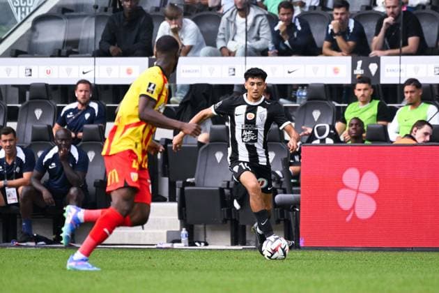 Yassin Belkhdim ( 14 - Angers ) and Kevin Danso ( 4 - Lens ) during the Ligue 1 match between Angers SCO and RC Lens at Stade Raymond Kopa on August 18, 2024 in Angers, France. ( Photo by federico pestellini panoramic ) - FOOTBALL : Angers vs Lens - Ligue 1 - 18 08 2024 FedericoPestellini Panoramic 