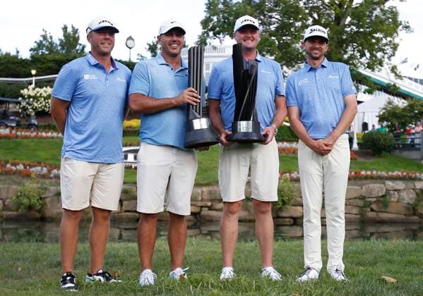 WHITE SULPHUR SPRINGS, WV - AUGUST 18: Team Smash GC Jason Kokrak, Brooks Koepka, Talor Gooch, and John Catlin pose with the trophy after winning the LIV Greenbrier Tournament at The Old White Course on August 18, 2024, in White Sulphur Springs, WV. (Photo by Lee Coleman Icon Sportswire) GOLF: AUG 18 LIV Golf League Greenbrier EDITORIAL USE ONLY Icon155240818047