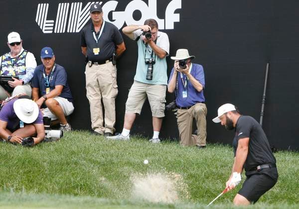 WHITE SULPHUR SPRINGS, WV - AUGUST 18: Legion XIII GC s Jon Rahm watches his shot from the bunker on the 18th green during the final round of the LIV Golf League Greenbrier at The Old White Course on August 18, 2024, in White Sulphur Springs, WV. (Photo by Lee Coleman Icon Sportswire) GOLF: AUG 18 LIV Golf League Greenbrier EDITORIAL USE ONLY Icon155240818087