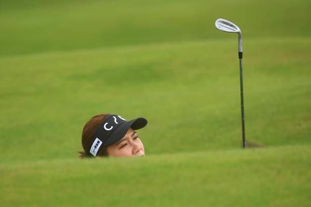 19th August 2024; Old Course at St Andrews, St Andrews, Fife, Scotland; AIG Womens Open Golf, Practice Day 1; Hikaru Yoshimoto of Japan plays from the road hole bunker on the seventeenth hole of the Old Course, St Andrews Links during a practice round at the AIG Women& x2019;s Open  ActionPlus12683332 DavidxYoung