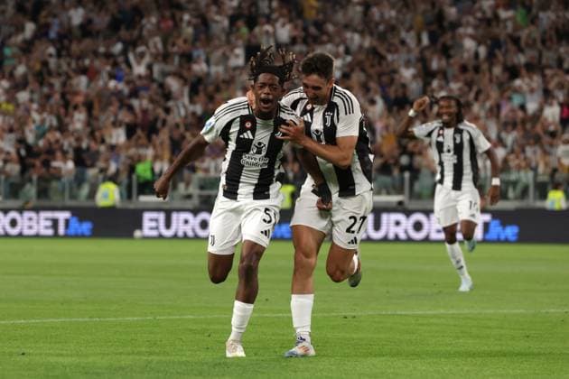 Turin, Italy, 19th August 2024. Samuel Mbangula Tshifunda of Juventus celebrates with team mate Andrea Cambiaso after scoring to give the side a 1-0 lead during the Serie A match at Allianz Stadium, Turin. Picture credit should read: Jonathan Moscrop Sportimage EDITORIAL USE ONLY. No use with unauthorised audio, video, data, fixture lists, club league logos or live services. Online in-match use limited to 120 images, no video emulation. No use in betting, games or single club league player publications. SPI-3257-0009