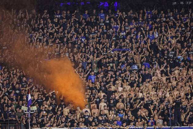 GNK Dinamo Zagreb v Qarabag - UEFA Champions Qualifying Play-Off: First Leg ZAGREB, CROATIA - AUGUST 20: Dinamo supporters lit flares on stands during the UEFA Champions Qualifying Play-Off First Leg match between GNK Dinamo Zagreb and Qarabag at Stadion Maksimir on August 20, 2024 in Zagreb, Croatia.  LukaxStanzl PIXSELL