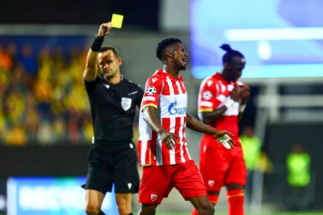UEFA Champions league play off 2024 2025 Bodo Glimt Red Star Bodo 20240820 Red Stars s Nasser Djiga reacts as he receives a yellow card from referee Ivan Kruzliak during the Champions League play off match between Bodo Glimt and Crvena Zvezda Red Star at the Aspmyra stadium in Bodo, Norway, on Tuesday Photo Mats Torbergsen NTB Bodo Norway EDITORIAL USE ONLY RESTRICTED USE FOR BETTING COMPANIES  Copyright: xMatsxTorbergsenx xNTBx