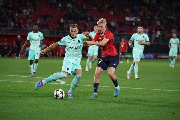 Tomas HOLES (Slavia Prague) et Hakon HARALDSSON (LOSC Lille) lors du match LOSC Lille vs Slavia Prague, Barrages Ligue des Champions, stade du Hainaut Valenciennes, le 20 août 2024 - photo Laurent Sanson Panoramic FOOTBALL : LOSC Lille vs Slavia Prague - Play-offs Barrages Ligue des Champions 20 08 2024 LaurentSanson Panoramic 