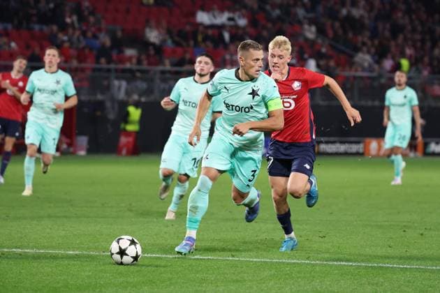 Tomas HOLES (Slavia Prague) et Hakon HARALDSSON (LOSC Lille) lors du match LOSC Lille vs Slavia Prague, Barrages Ligue des Champions, stade du Hainaut Valenciennes, le 20 août 2024 - photo Laurent Sanson Panoramic FOOTBALL : LOSC Lille vs Slavia Prague - Play-offs Barrages Ligue des Champions 20 08 2024 LaurentSanson Panoramic 