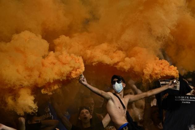 GNK Dinamo Zagreb v Qarabag - UEFA Champions Qualifying Play-Off: First Leg ZAGREB, CROATIA - AUGUST 20: Dinamo Zagreb Fans, Bad Blue Boys (BBB) lit flares on the stands during the UEFA Champions Qualifying Play-Off First Leg match between GNK Dinamo Zagreb and Qarabag at Stadion Maksimir on August 20, 2024 in Zagreb, Croatia.  JosipxRegovic PIXSELL