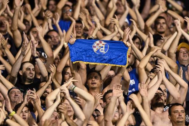 Sport Bilder des Tages GNK Dinamo Zagreb v Qarabag - UEFA Champions Qualifying Play-Off: First Leg ZAGREB, CROATIA - AUGUST 20: Dinamo Zagreb Fans, Bad Blue Boys (BBB) cheer on the stands during the UEFA Champions Qualifying Play-Off First Leg match between GNK Dinamo Zagreb and Qarabag at Stadion Maksimir on August 20, 2024 in Zagreb, Croatia.  JosipxRegovic PIXSELL