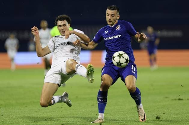 Zagreb, 20.08.2024. - Stadion Maksimir, UEFA CHAMPIONS LEAGUE - 2024 25 Play-offs 1st leg - GNK Dinamo (blue) - QarabaÄü FK (white) 3:0 ArbÃ«r Hoxha (11) vs Bahlul Mustafazade (13) 