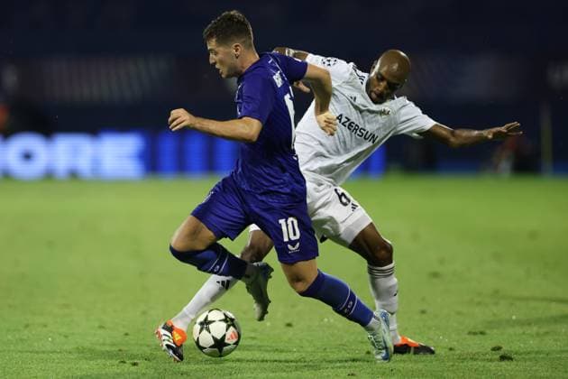 Zagreb, 20.08.2024. - Stadion Maksimir, UEFA CHAMPIONS LEAGUE - 2024 25 Play-offs 1st leg - GNK Dinamo (blue) - QarabaÄü FK (white) 3:0 Martin Baturina (10) vs Julio Romao (6) 