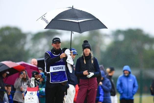 21st August 2024; Old Course at St Andrews, St Andrews, Fife, Scotland; AIG Womens Open Golf, Practice Day 3; Nelly Korda of the USA shelters from the rain on the 17th tee of the Old Course, St Andrews Links during the pro-am at the AIG Women& x2019;s Open  ActionPlus12683589 DavidxYoung