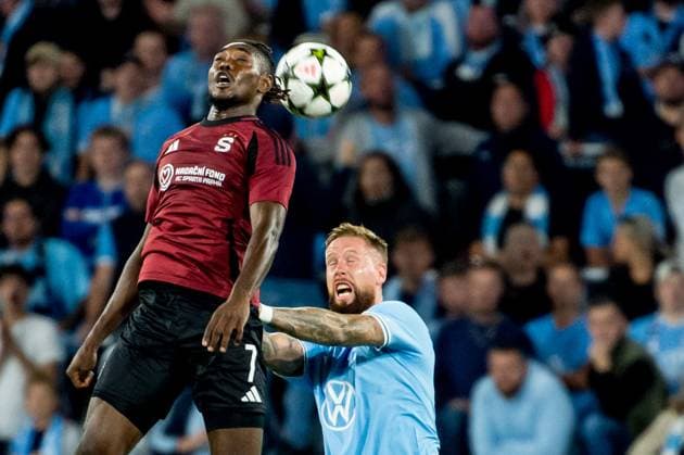 240821 Victor Olatunji of Sparta Prague and Pontus Jansson of Malmö FF during the UEFA Champions League football match between Malmö FF and Sparta Prague on August 21, 2024 in Malmö Photo Christian Örnberg BILDBYRAN COP 166 CO0456 fotboll football soccer fotball champions league malmö ff sparta prag bbeng play off bbauto  Copyright: CHRISTIANxÖRNBERG BB240821CO038