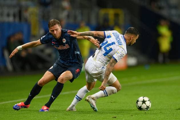 SOCCER - UEFA CL, Kyiv vs RBS LUBLIN,POLAND,21.AUG.24 - SOCCER - UEFA Champions League, qualification, FC Dynamo Kyiv vs Red Bull Salzburg. Image shows Ignace Van Der Brempt (RBS) and Vladyslav Dubinchak (Kyiv).  GEPAxpictures xAdamxNurkiewicz