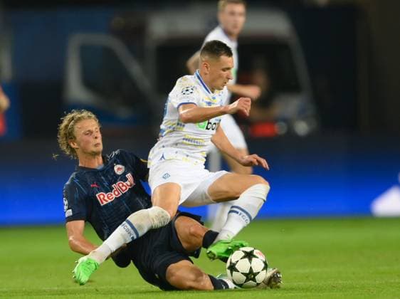 SOCCER - UEFA CL, Kyiv vs RBS LUBLIN,POLAND,21.AUG.24 - SOCCER - UEFA Champions League, qualification, FC Dynamo Kyiv vs Red Bull Salzburg. Image shows Maurits Kjaergaard (RBS) and Vladyslav Kabaev (Kyiv).  GEPAxpictures xAdamxNurkiewicz