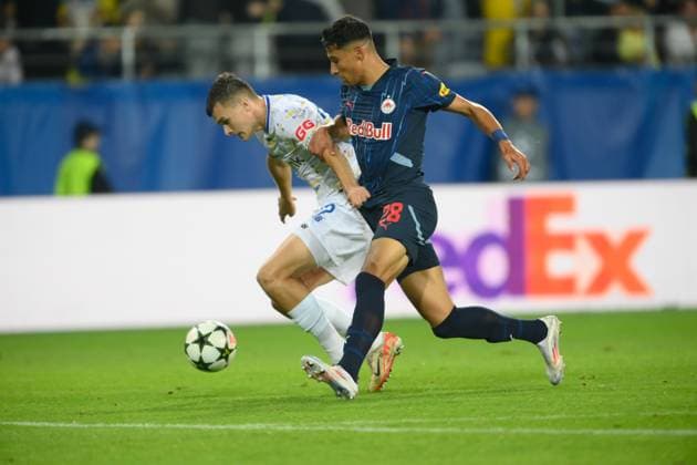 SOCCER - UEFA CL, Kyiv vs RBS LUBLIN,POLAND,21.AUG.24 - SOCCER - UEFA Champions League, qualification, FC Dynamo Kyiv vs Red Bull Salzburg. Image shows Mykhavko Taras Vasyliovych (Kyiv) and Adam Daghim (RBS).  GEPAxpictures xAdamxNurkiewicz