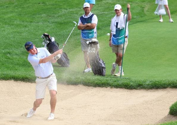 CASTLE ROCK, CO - AUGUST 21: NFL, American Football Herren, USA Hall of Fame quarterback Peyton Manning plays a shot out of a sand trap on the 18th hole during the PGA, Golf Herren FedExCup BMW Championship Pro Am on August 21st, 2024, at Castle Pines Golf Club in Castle Rock, Colorado. (Photo by Brian Spurlock Icon Sportswire) GOLF: AUG 21 PGA FedExCup Playoffs - BMW Championship Pro Am EDITORIAL USE ONLY Icon2408218