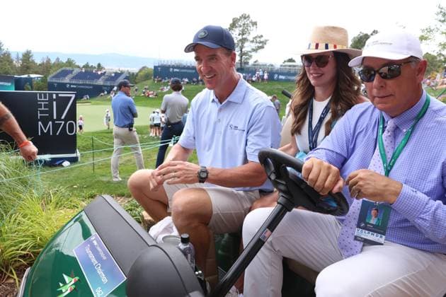 CASTLE ROCK, CO - AUGUST 21: NFL, American Football Herren, USA Hall of Fame quarterback Peyton Manning leaves on a golf cart with his wife Ashley Manning after finishing on the 18th hole during the PGA, Golf Herren FedExCup BMW Championship Pro Am on August 21st, 2024, at Castle Pines Golf Club in Castle Rock, Colorado. (Photo by Brian Spurlock Icon Sportswire) GOLF: AUG 21 PGA FedExCup Playoffs - BMW Championship Pro Am EDITORIAL USE ONLY Icon24082112
