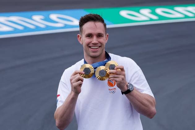 Harry Lavreysen dutch olympic champion track cyclist on his golden bike shows his three golden medals during previews ahead of the F1 Grand Prix of Netherlands at Circuit Park Zandvoort on August 22, 2024 in Zandvoort, Netherlands Defodi 704 MTB20240822F1ZandvoortDag1352554 Defodi-704