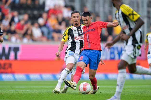 SOCCER - UEFA EL, LASK vs Bukarest LINZ,AUSTRIA,22.AUG.24 - SOCCER - UEFA Europa League, qualification, Linzer ASK vs FCSB Bukarest. Image shows Robert Zulj (LASK) and Adrian Sut (Bukarest).  GEPAxpictures xChristianxMoser