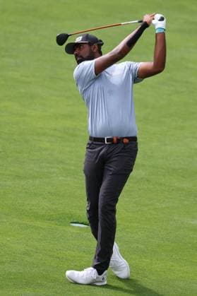 CASTLE ROCK, CO - AUGUST 22: Sahith Theegala follows through on his second shot on eight during the first round of the BMW Championship on August 22, 2024 at Castle Pines Golf Club in Castle Rock, CO. (Photo by Scott Winters Icon Sportswire) GOLF: AUG 22 PGA, Golf Herren FedExCup Playoffs - BMW Championship EDITORIAL USE ONLY Icon2408220260