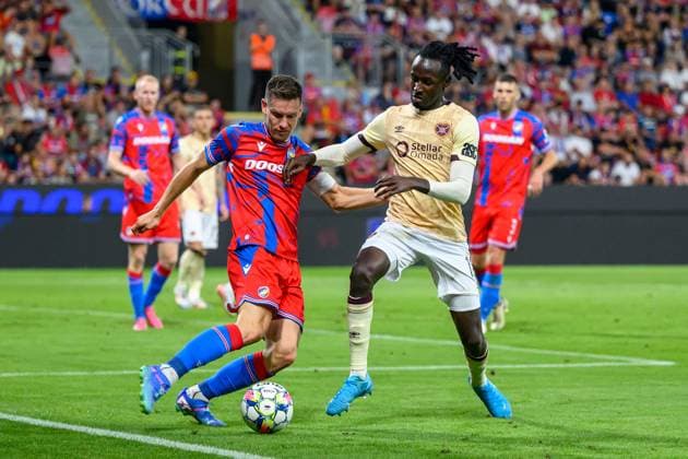 Viktoria Plzen v Heart of Midlothian Europa League 22 08 2024. Play Off Leg 1 of 2 Malachi Boateng of Hearts tackles Lukas Kalvach of FC Viktoria Plzen during the UEFA Europa League play off first leg match between Viktoria Plzen and Heart of Midlothian at Doosan Arena, Plzen, Czech Republic on 22 August 2024. Plzen Doosan Arena Czech Republic Editorial use only , Copyright: xMalcolmxMackenzie HeartsxFCx PSI-20238-0030