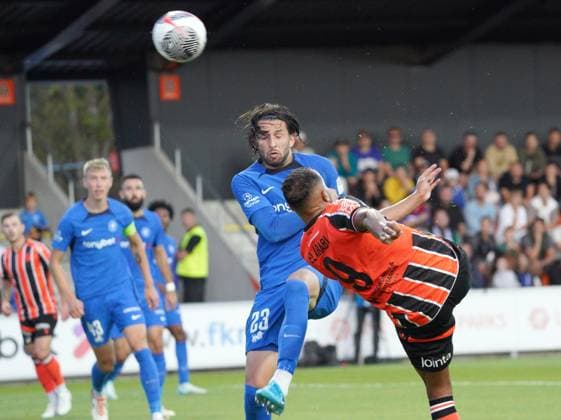 22.08.2024, Riga, Latvia. Latvia™s RFS Herdi Prenga (left) vies for the ball with Cyprus™ APOEL El-Arabi Youssef during their UEFA Europa League play offs game between RFS (Latvia) and APOEL (Cyprus). Foto: Roman Koksarov Riga Latvia Copyright: xRomÄnsxKokÅ¡arovsx soc_RFS-APOEL20240822rk432.JPG
