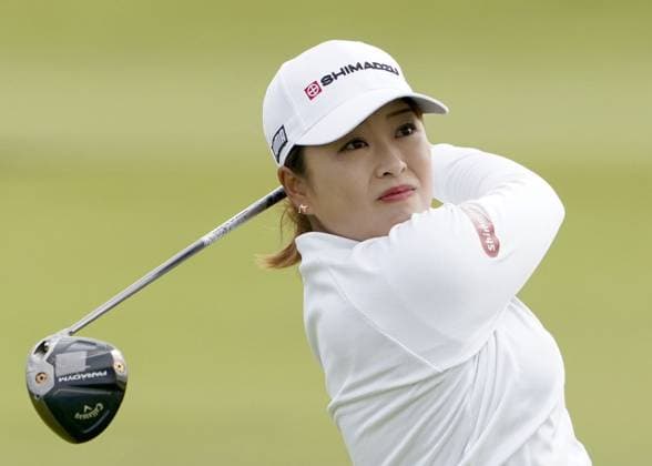 Sport Bilder des Tages Golf: Women s British Open Mao Saigo of Japan hits off the second tee during the first round of the Women s British Open golf championship on Aug. 22, 2024, at St. Andrews Old Course in St. Andrews, Scotland.  A14AA0003318807P