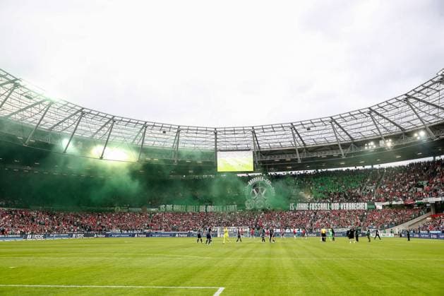 23 08 2024, xtgx, Soccer 2 Bundesliga, Hannover 96 Hamburger SV emspor, v l symbol photo, symbol image, fans, spectators, audience, pyro, smoke, fog, pyrotechnics DFL DFB REGULATIONS PROHIBIT ANY USE OF PHOTOGRAPHS as IMAGE SEQUENCES and or QUASI VIDEO Hannover