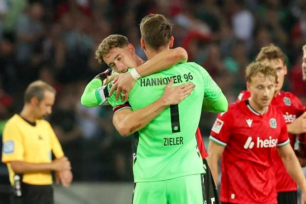 Phil Neumann Hannover 96 and Torhueter Ron Robert Zieler Hannover 96 cheer, 2 Bundesliga, Hannover 96 vs Hamburger SV, Heinz von Heiden Arena on August 23, 2024 in Hanover, Germany Photo by Marco Steinbrenner DeFodi Images Phil Neumann Hannover 96 and Torhueter Ron Robert Zieler Hannover 96 cheer, 2 Bundesliga, Hannover 96 vs Hamburger SV, Heinz von Heiden Arena, August 23, 2024 in Hanover, Germany Photo by Marco Steinbrenner DeFodi Images DFB DFL REGULATIONS PROHIBIT ANY USE OF PHOTOGRAPHS AS IMAGE SEQUENCES AND OR QUASI VIDEO Defodi 700 han hsv 20240823 089 Defodi-700 DFB DFL REGULATIONS PROHIBIT ANY USE OF PHOTOGRAPHS AS IMAGE SEQUENCES AND OR QUASI-VIDEO.