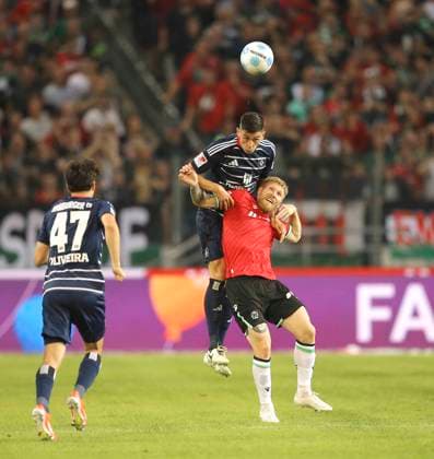 Photo Dennis Hadzikadunic heads against Andreas Voglsammer H 96 Soccer 2 Bundesliga on Fri 23 08 2024 Hannover 96 Hamburger SV 1 0
