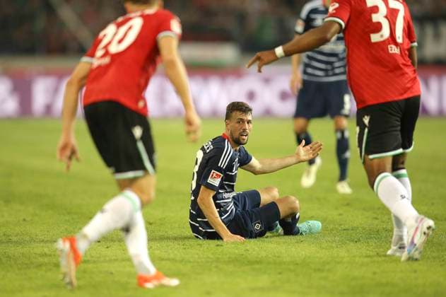 Photo Losers face at HSV , Jonas Meffert lies on the ground Football 2 Bundesliga on Fri 23 08 2024 Hannover 96 Hamburger SV 1 0