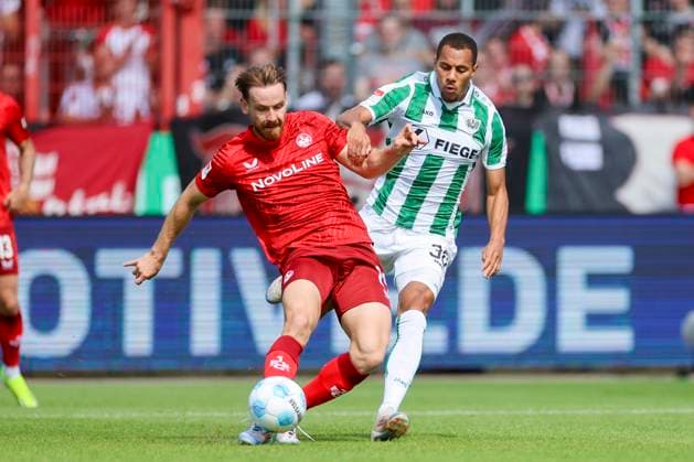 Jannis Heuer 1 FC Kaiserslautern and Etienne Amenyido SC Preussen Muenster battle for the ball, 2 Bundesliga, Preußen Münster vs 1 FC Kaiserslautern, Preußenstadion, August 24, 2024 in Münster, Germany Photo by Marco Steinbrenner DeFodi Images Jannis Heuer 1 FC Kaiserslautern and Etienne Amenyido SC Preussen Muenster battle for the ball, 2 Bundesliga, Preußen Münster vs 1 FC Kaiserslautern, Preußenstadion, August 24, 2024 in Münster, Germany Photo by Marco Steinbrenner DeFodi Images DFB DFL REGULATIONS PROHIBIT ANY USE OF PHOTOGRAPHS AS IMAGE SEQUENCES AND OR QUASI VIDEO Defodi 700 scp fcK 20240824 023 Defodi-700 DFB DFL REGULATIONS PROHIBIT ANY USE OF PHOTOGRAPHS AS IMAGE SEQUENCES AND OR QUASI-VIDEO.