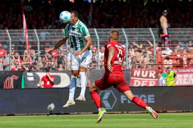 Etienne Amenyido SC Preussen Muenster and Erik Wekesser 1 FC Kaiserslautern battle for the ball, 2 Bundesliga, Preußen Münster vs 1 FC Kaiserslautern, Preußenstadion, August 24, 2024 in Münster, Germany Photo by Marco Steinbrenner DeFodi Images Etienne Amenyido SC Preussen Muenster and Erik Wekesser 1 FC Kaiserslautern battle for the ball, 2 Bundesliga, Preußen Münster vs 1 FC Kaiserslautern, Preußenstadion, August 24, 2024 in Münster, Germany Photo by Marco Steinbrenner DeFodi Images DFB DFL REGULATIONS PROHIBIT ANY USE OF PHOTOGRAPHS AS IMAGE SEQUENCES AND OR QUASI VIDEO Defodi 700 scp fcK 20240824 027 Defodi-700 DFB DFL REGULATIONS PROHIBIT ANY USE OF PHOTOGRAPHS AS IMAGE SEQUENCES AND OR QUASI-VIDEO.