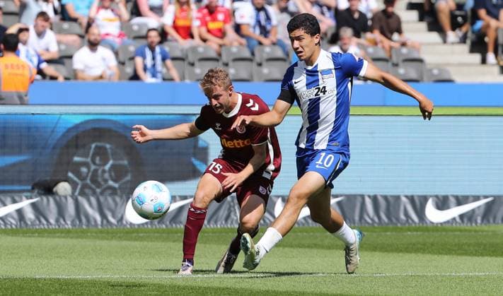 Sebastian Ernst, Ibrahim Maza duel match scene Action Sport Football Soccer DFL 2 Bundesliga Men 3 Matchday Season 2024 2025 24 08 2024 Hertha BSC Berlin vs SSV Jahn Regensburg DFL regulations prohibit any use of photographs as image sequences and or quasi video