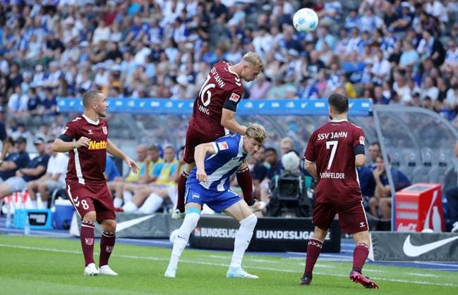 Andreas Geipl, Louis Breunig in a duel with Luca Schuler, Oscar Schönfelder Match scene Action Sport Soccer Football DFL 2 Bundesliga Men 3 Matchday Season 2024 2025 24 08 2024 Hertha BSC Berlin vs SSV Jahn Regensburg DFL regulations prohibit any use of photographs as image sequences and or quasi video