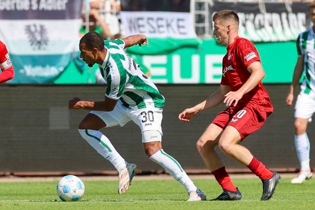 Etienne Amenyido SC Preussen Muenster and Tobias Raschl 1 FC Kaiserslautern battle for the ball, 2 Bundesliga, Preußen Münster vs 1 FC Kaiserslautern, Preußenstadion, August 24, 2024 in Münster, Germany Photo by Marco Steinbrenner DeFodi Images Etienne Amenyido SC Preussen Muenster and Tobias Raschl 1 FC Kaiserslautern battle for the ball, 2 Bundesliga, Preußen Münster vs 1 FC Kaiserslautern, Preußenstadion, August 24, 2024 in Münster, Germany Photo by Marco Steinbrenner DeFodi Images DFB DFL REGULATIONS PROHIBIT ANY USE OF PHOTOGRAPHS AS IMAGE SEQUENCES AND OR QUASI VIDEO Defodi 700 scp fcK 20240824 045 Defodi-700 DFB DFL REGULATIONS PROHIBIT ANY USE OF PHOTOGRAPHS AS IMAGE SEQUENCES AND OR QUASI-VIDEO.