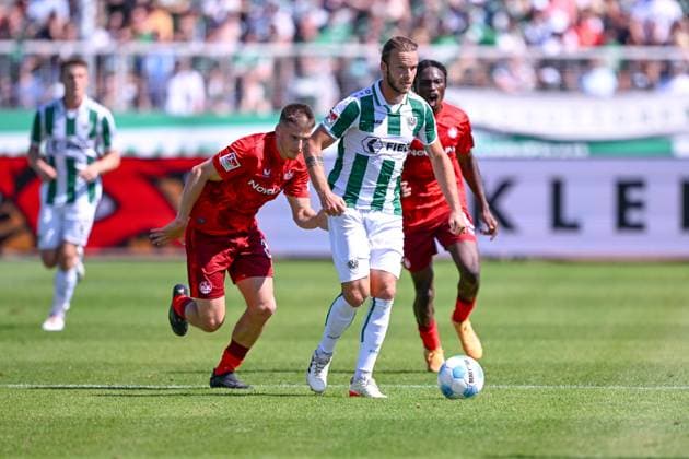 24 08 2024, Football, 2 Bundesliga, Matchday 3 Season 2024 2025, Preußen Münster 1 FC Kaiserslautern, Tobias Raschl 1 FC Kaiserslautern , Jorrit Hendrix SC Preussen Münster xRHR PHOTO TKx Copyright: RHR-FOTOx RHR-FOTO TK