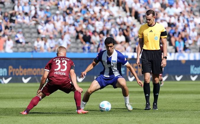 Kai Pröger, Ibrahim Maza, referee Richard Hempel duel match scene Action Sport Football Soccer DFL 2 Bundesliga Men 3 Matchday Season 2024 2025 24 08 2024 Hertha BSC Berlin vs SSV Jahn Regensburg DFL regulations prohibit any use of photographs as image sequences and or quasi video