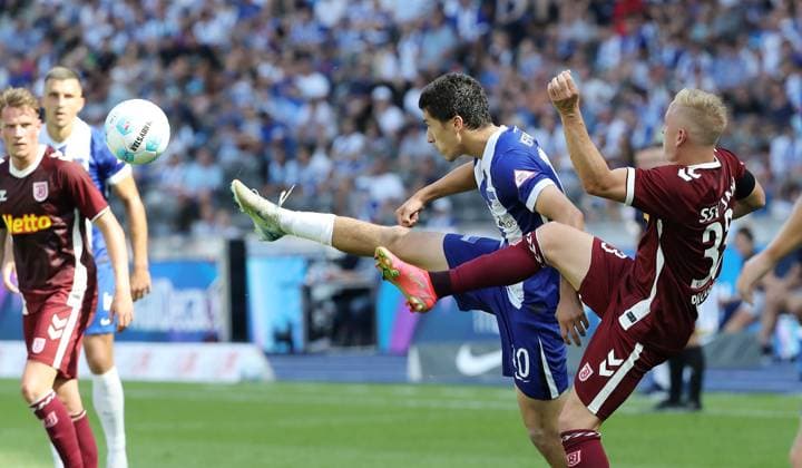 Ibrahim Maza in a duel with Kai Pröger Match scene Action Sport Football Soccer DFL 2 Bundesliga Men 3 Matchday Season 2024 2025 24 08 2024 Hertha BSC Berlin vs SSV Jahn Regensburg DFL regulations prohibit any use of photographs as image sequences and or quasi video
